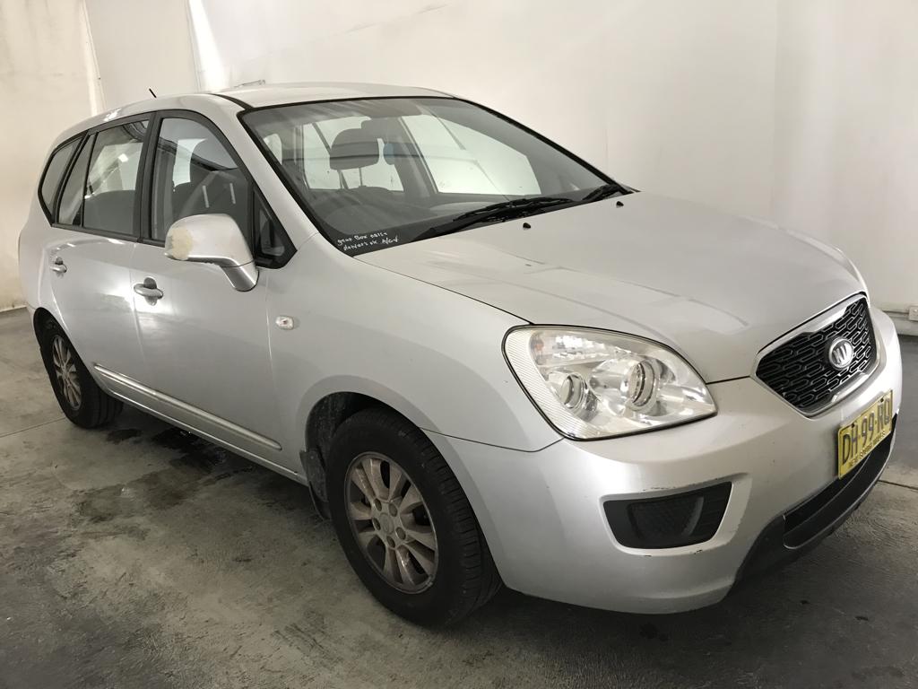 2010 KIA RONDO Si UN MY11 SILVER 5 SP MANUAL 4D WAGON United Auctions NSW